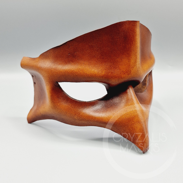 Brown leather bird mask
