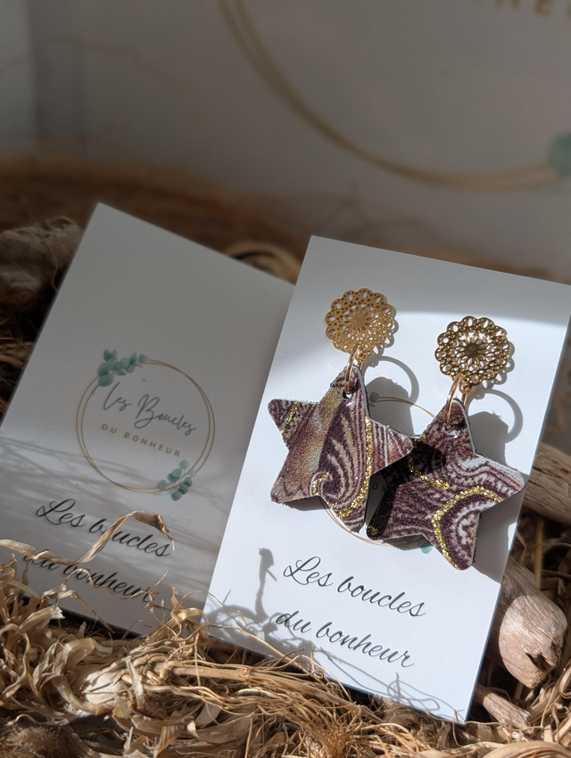 Boucles d'oreilles Petite étoile bronze doré st032