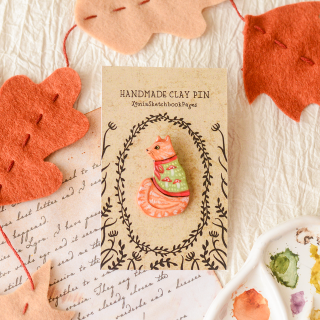 Familiar Collection &quot;A Ginger Cat in Mushroom Cape&quot; clay pin