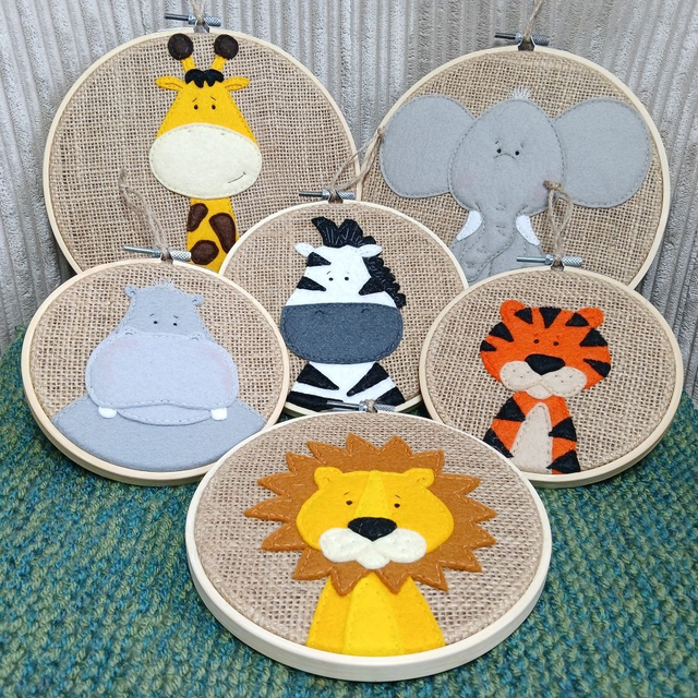 Safari Range, hoop art. Fully hand-sewn wool felt designs on hessian. Elephant. Lion. Giraffe. Tiger. Hippo. Zebra.