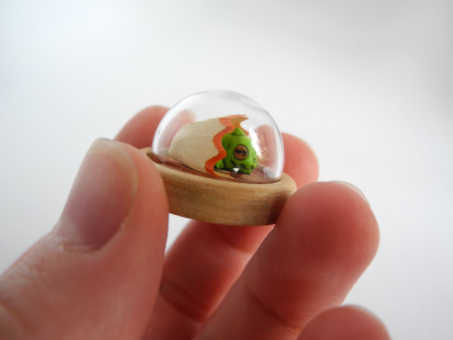 Sleeping dinosaur in a glass dome - miniature pendant in collaboration with @minidinosaur_comics