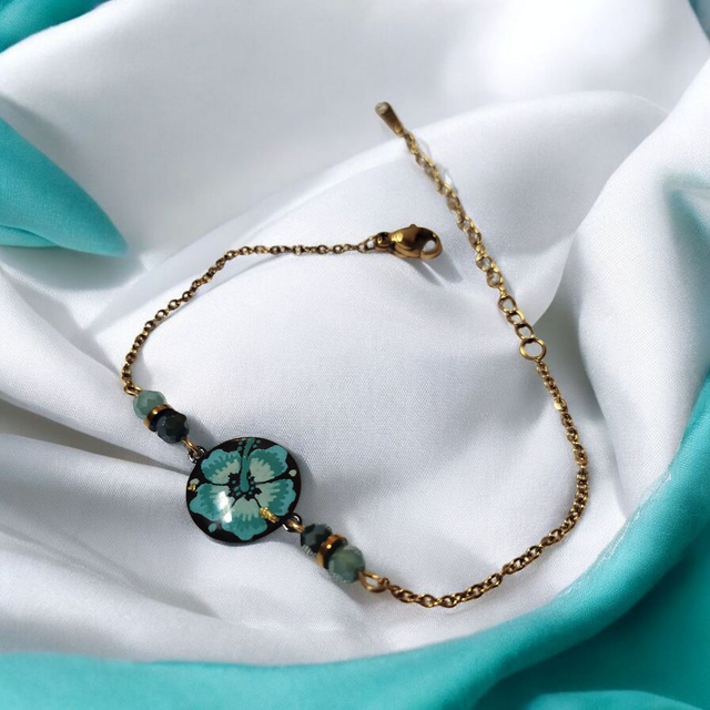 Bracelet dessiné Flora acier inoxydable bleu turquoise