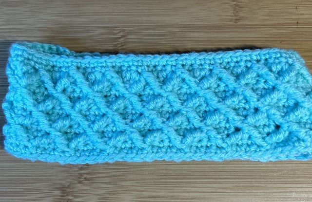 7025. Children's ear warmers