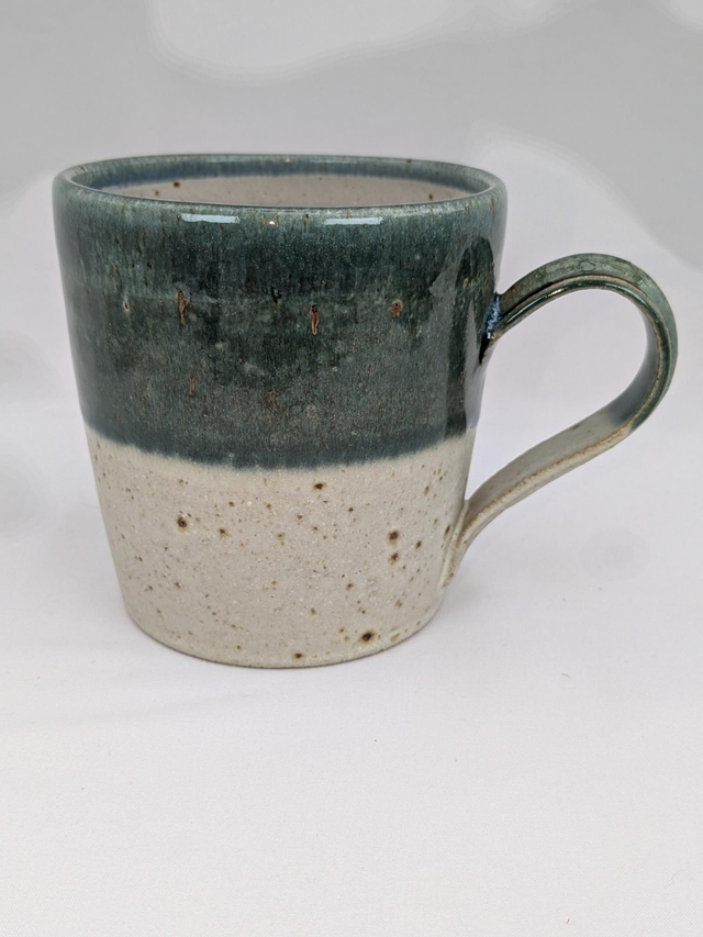 Green and oatmeal mug