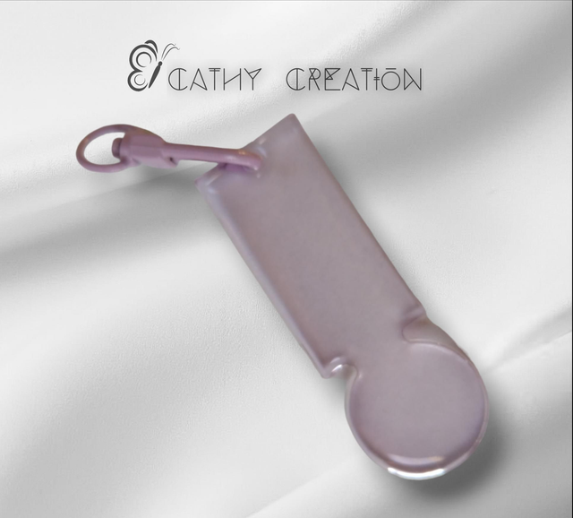 Jeton de caddie violet transparent 