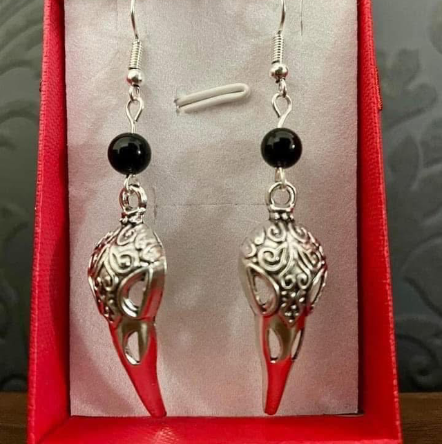 Black Onyx bird skulls on silver plated ear hooks 