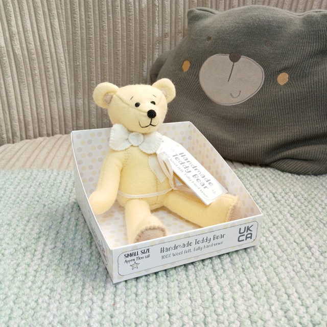 Pastel yellow bear without a name. Small size, handmade teddy bear. UKCA. Tray base packaging. Standard Wool Felt. Cream. Beige.