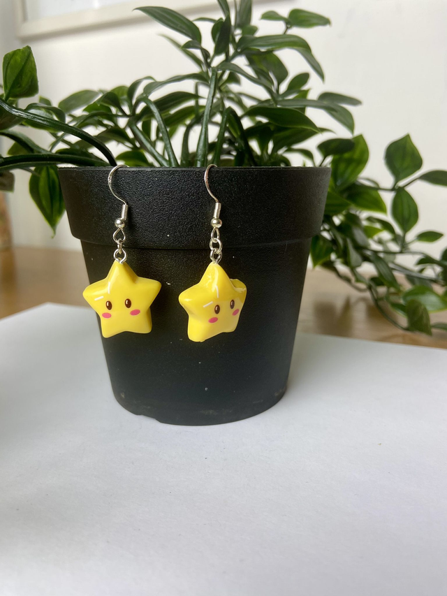 Cartoon star earrings.