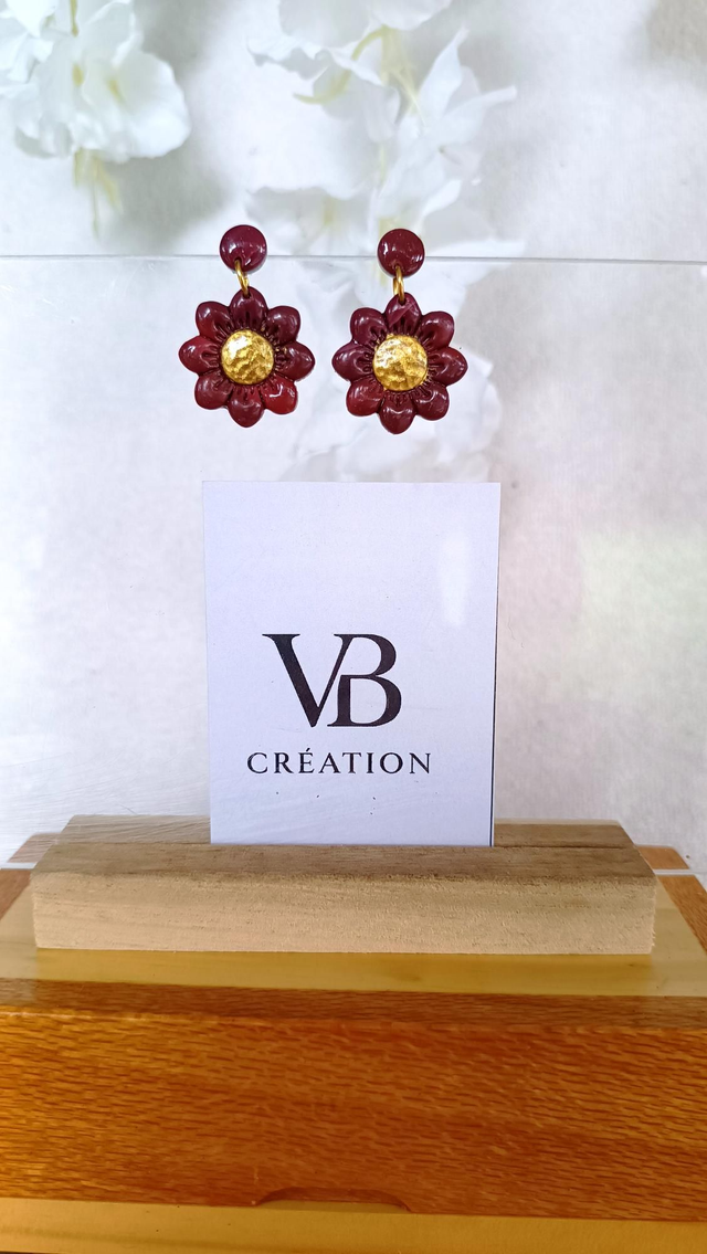 Marguerites bordeaux dorées 