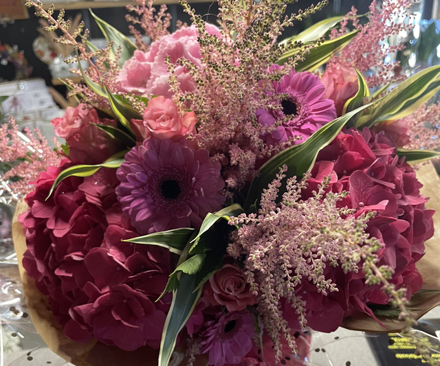Pink aqua pack.  Hydrangeas, roses, gerbras and foilages  