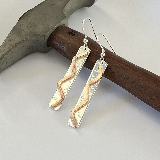 Sterling Silver with Copper Accent.