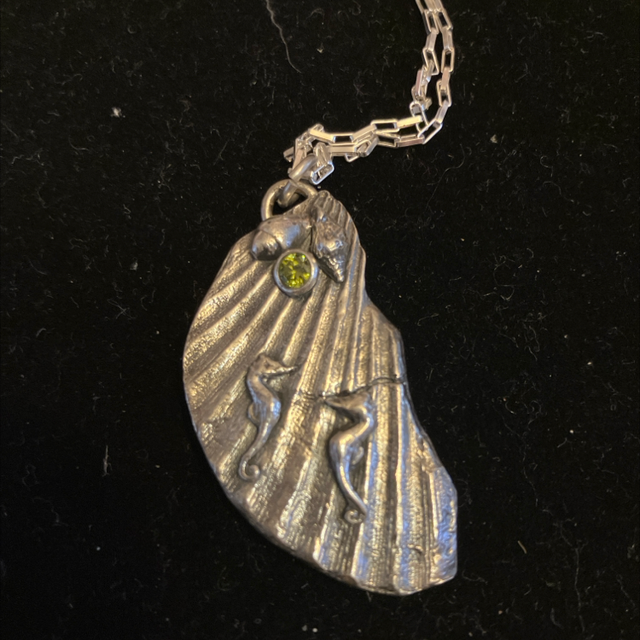 Seahorses and shell pendant 