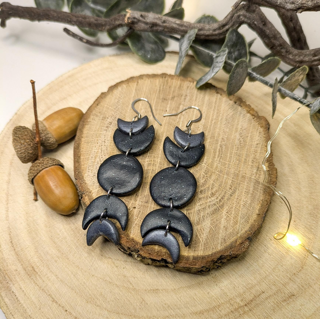 Pendientes de arcilla polimérica de fases lunares