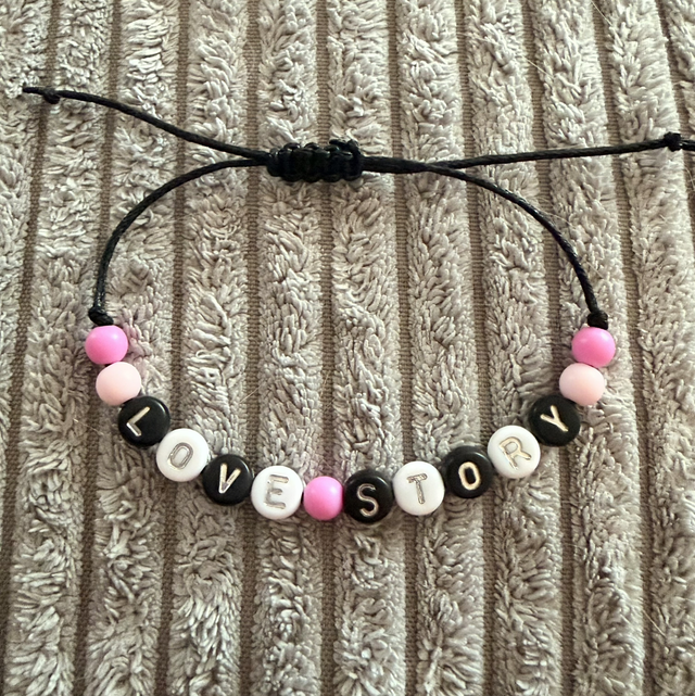 Fine adjustable cord Love Story bracelet 