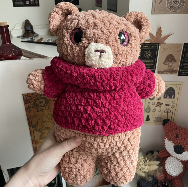 Ours avec pull