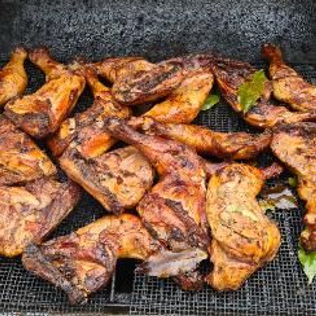 o/La Cuisse de poulet boucané