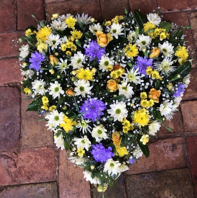 Loose open fresh flower funeral heart 