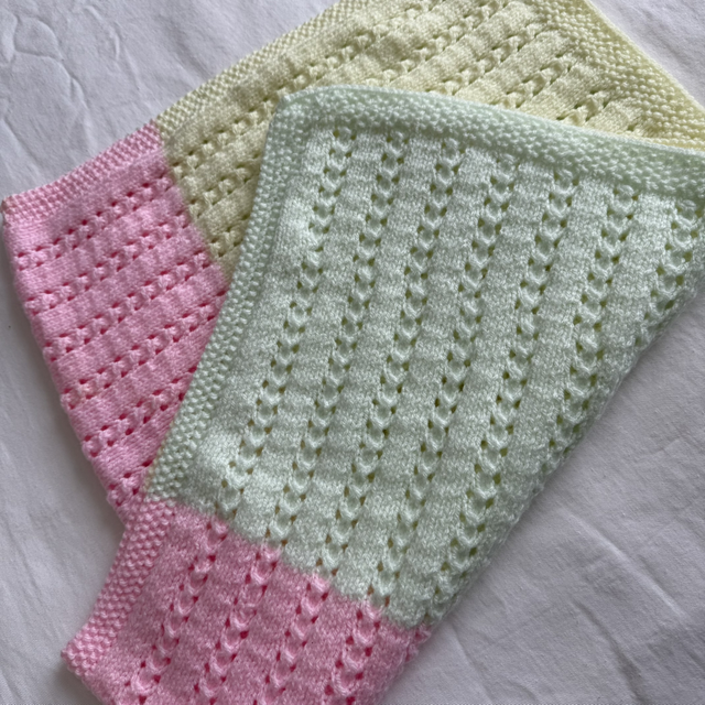 Pastel rainbow pointelle knitted buggy blanket