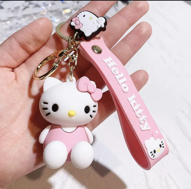 0168 - Hello Kitty - zittend - roze