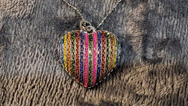 Silver Coloured Filigree Heart Pendant Necklace With Rainbow Back