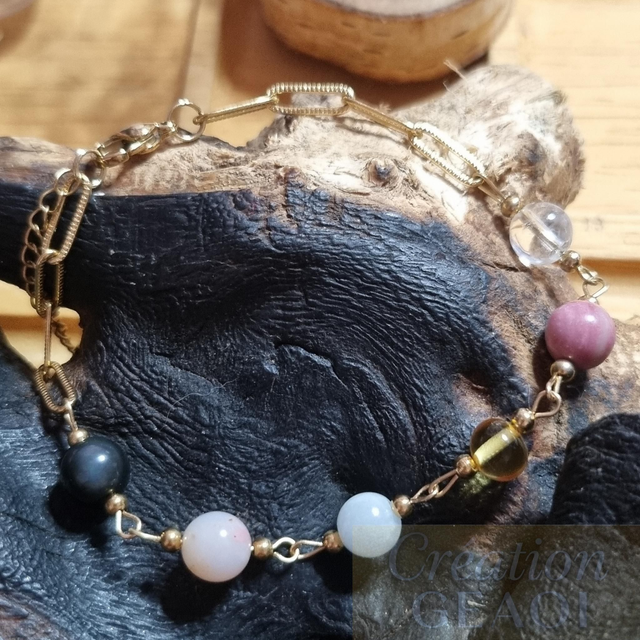 Bracelet des êtres chers :obsidienne noire, Opale Rose, emeraude, ambre, rhodocrosite, cristal de roche