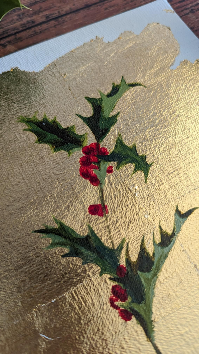 Brin de houx sur fond d&#039;or