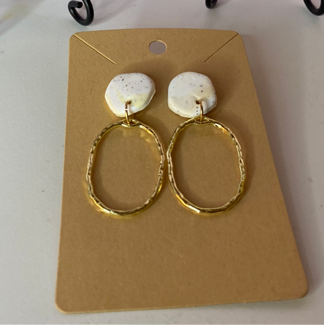 White Earrings With Gold Flecks And Gold Oval Accessories 