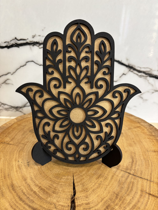 Petite main de Fatma Noir sur or