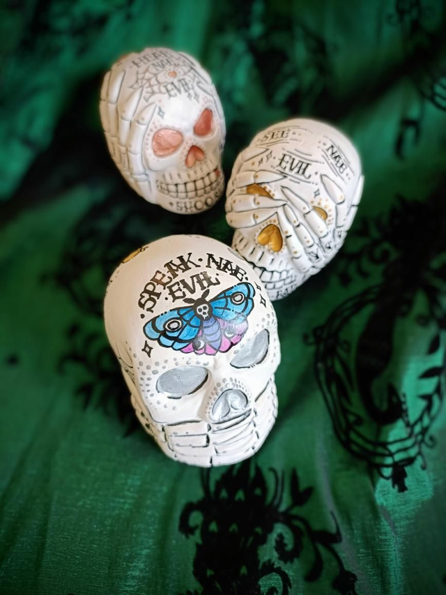 Ceramic skulls - hear no evil, see no evil and speak no evil 