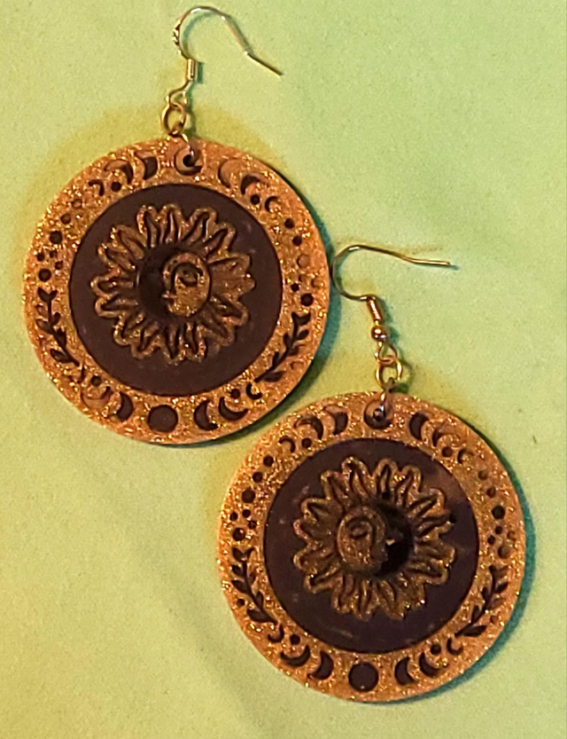 Boucles d&#039;oreilles soleil