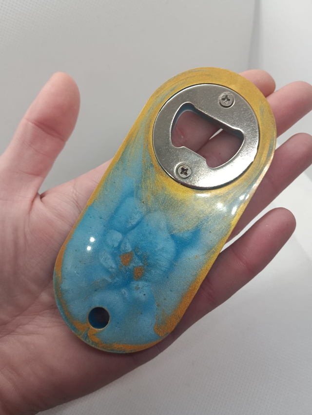 Décapsuleur bleu et or 