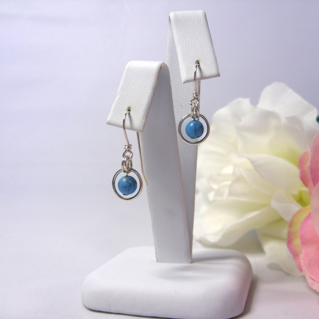 Turquoise gemstone dangle earrings with bead in a ring of recycled silver