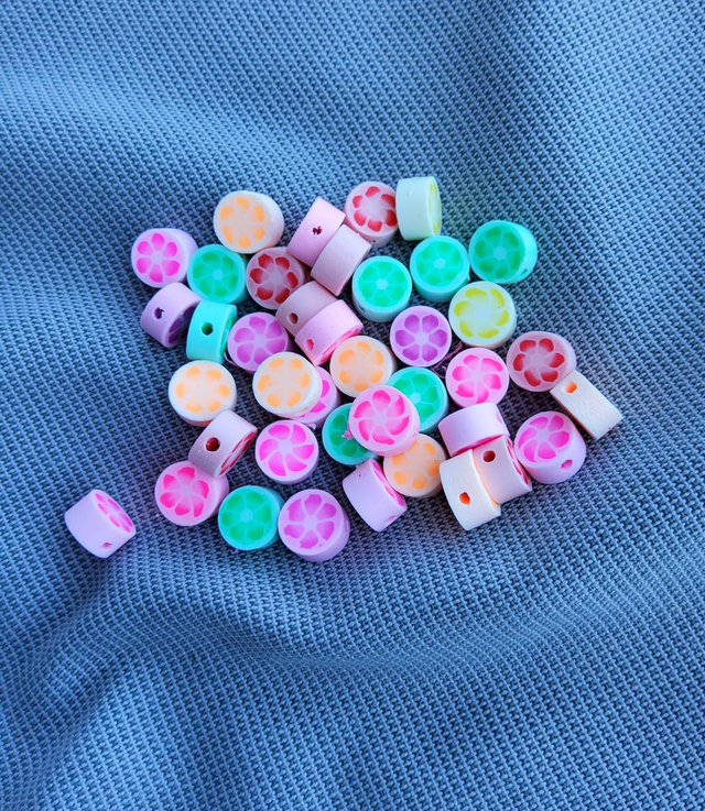 Perles en perles polymère "fleurs des îles" (Fimo) 20pièces