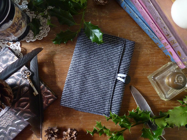 Protège livre écriture blanche sur fond noir