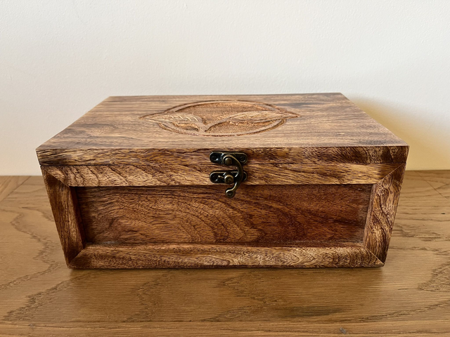 Tea box with six compartments made of Mango wood.