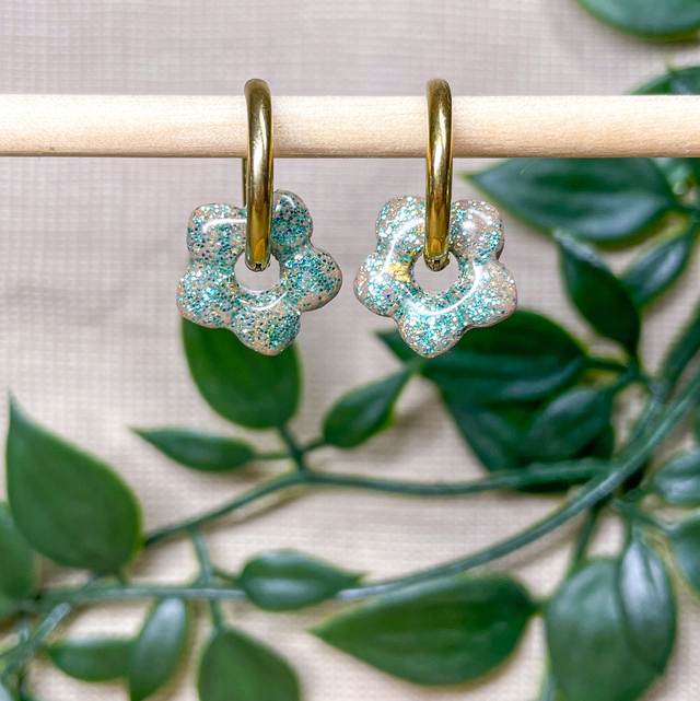 Mini fleurs marron à paillettes vertes 