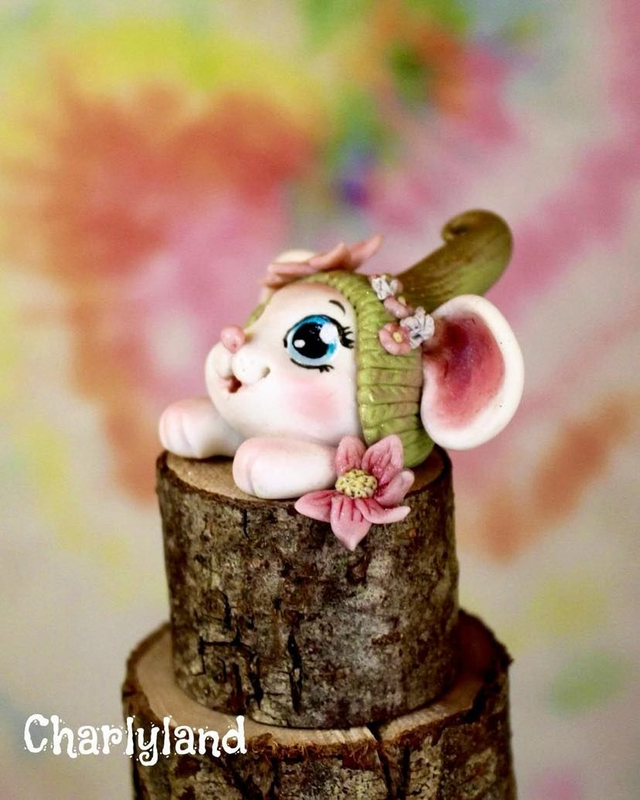 Souris sur socle haut