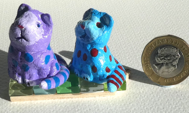 Wonderful Gifts. "Kitties on a Canvas Wedge" are fun handmade gifts. Purple and blue