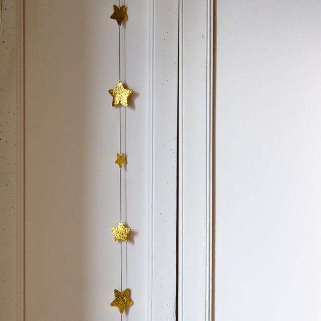 Guirlande d’étoiles en cuir et laiton