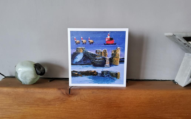 Father Christmas and his flying sheep over Pickering Castle. 6x6" Christmas card