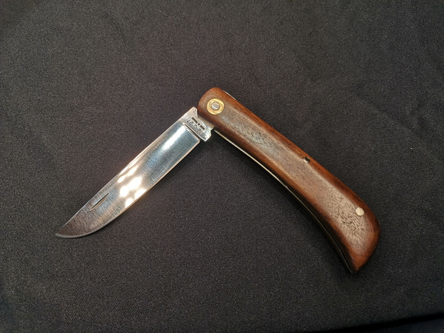 Le Mineur manche noyer