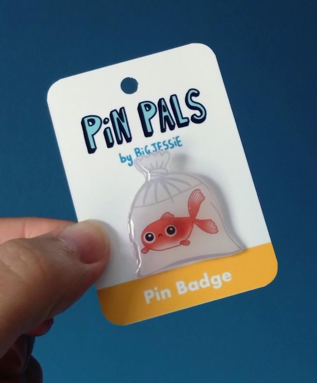 Goldfish in a bag pin badge