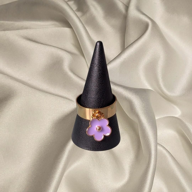 Bague doré petite fleur violette 