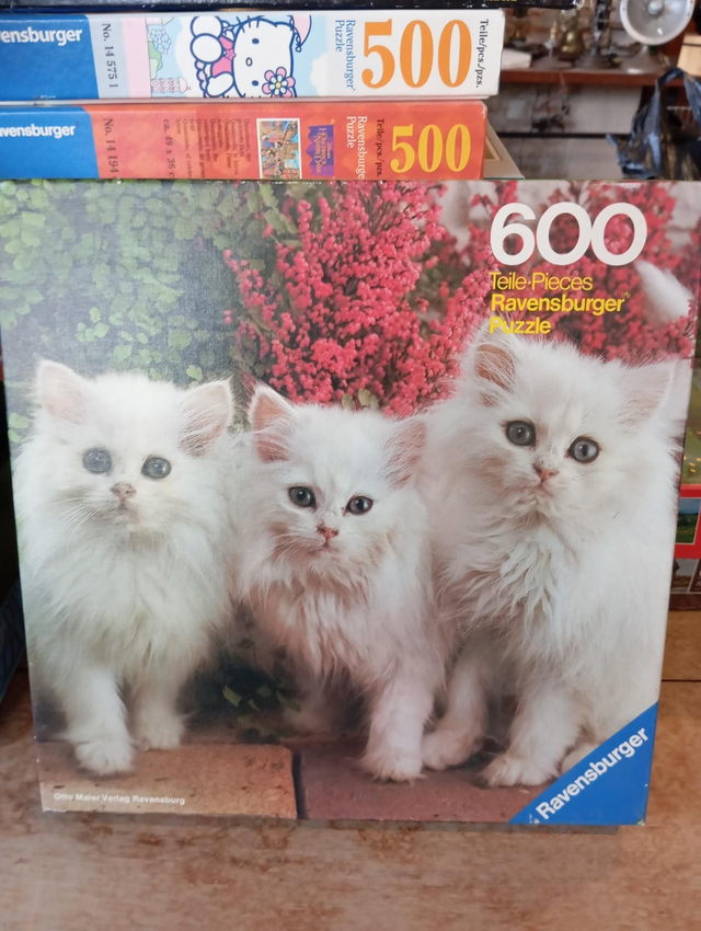 Puzzle ravensburger 600 pièces chats blancs