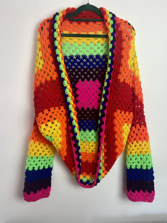 Rainbow shrug style cardigan.