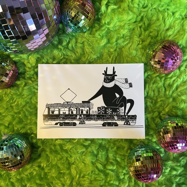 Christmas tram. Deer in scarf