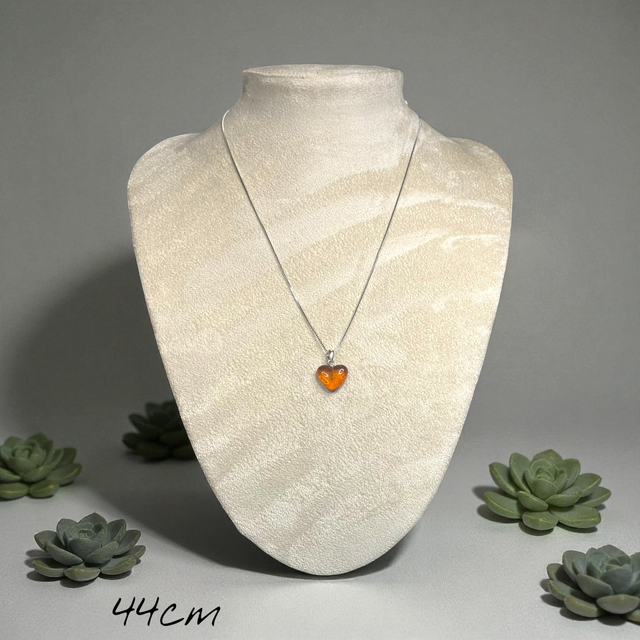 Amber and sterling silver pendant necklace