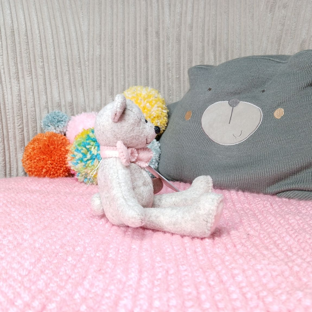 No name* traditional beige bear. Soft pink bow tie. Small size, handmade teddy bear. UKCA. Tray base. Standard Wool Felt. Beige. Cream. Blush. Pastel.