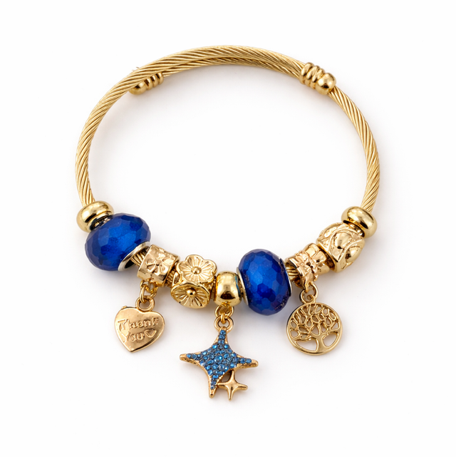 Pulsera acero dorado blue charm 
