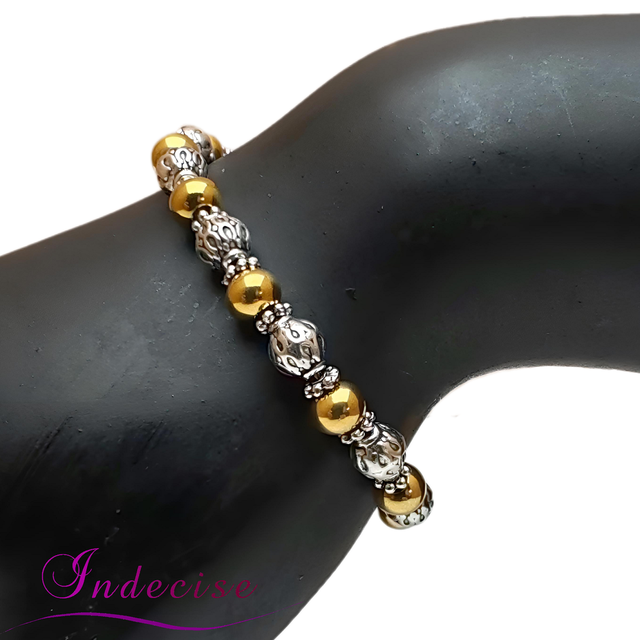 Bracelet ajustable acier et perles tibétaines couleur or et argent